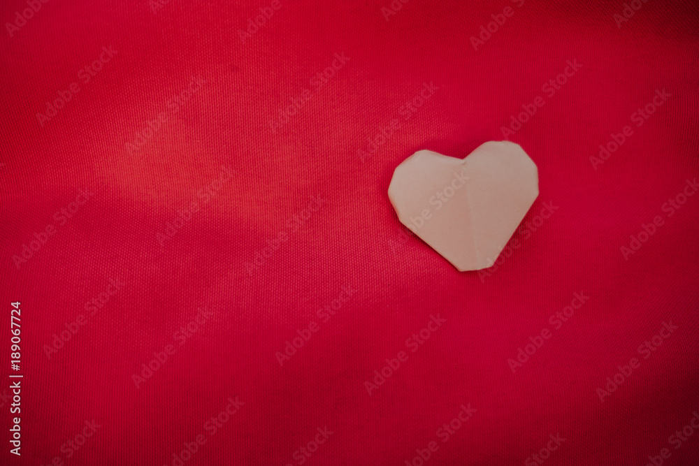 pink heart placed on red background. image for valentine day, idea, love, celebration, copy space, decoration concept