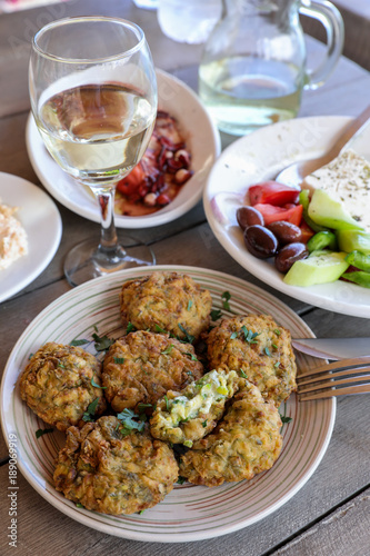 Fried zucchini balls plate in the greek tavern.