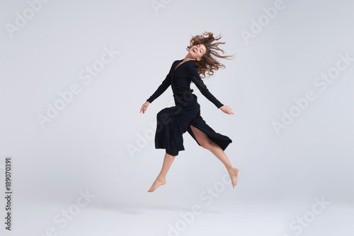Young attractive woman hovering in the air