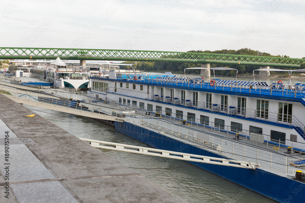 Danube river and passenger touristic ships moored in Bratislava, Slovakia