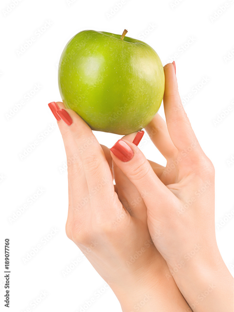 Hands holding green apple isolated with clipping path Hands holding green apple isolated with clipping path