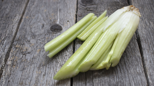 Celery on wooden table