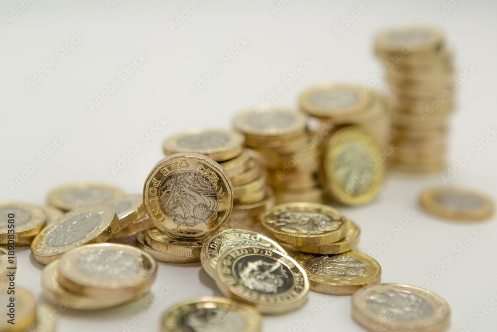 Stacks of British one pound coins Stacks of British one pound coins