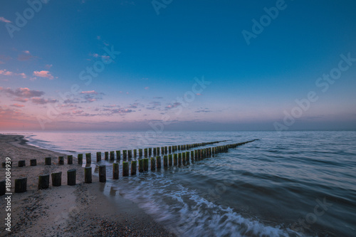 Timber Piles In The Morning At Renesse Zeeland   Netherland