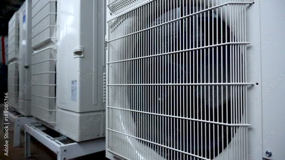 Air conditioner unit fan rotating. Slow motion 250fps Air conditioner unit fan rotating. Slow motion 250fps