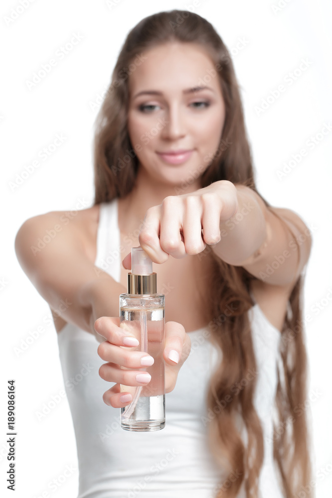 beautiful woman holding a bottle. beautiful woman holding a bottle.
