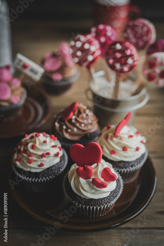 Sweet cupcakes with hearts on the top,selective focus and love concept