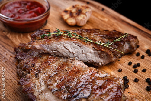 Meat steak on the wooden board