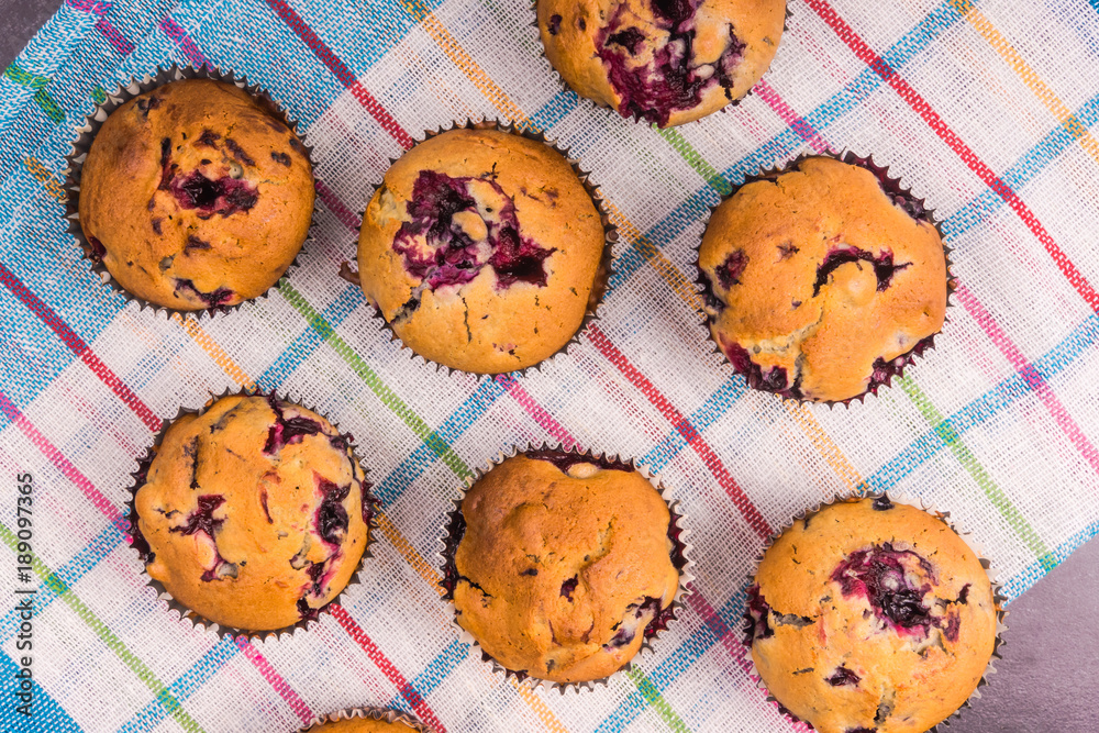 Homemade muffins on a rustic table closeup