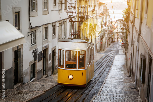 The Gloria Funicular in the city center of Lisbon in a beautiful summer day, Portugal photo