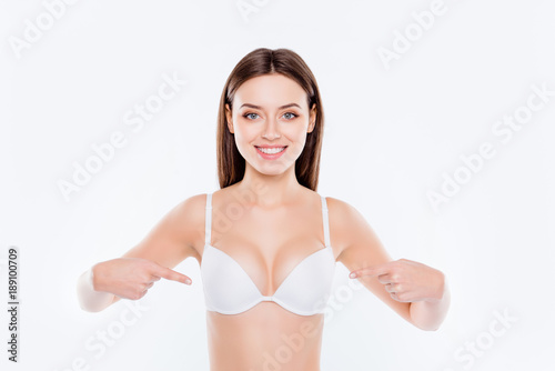 Portrait of beautiful perfect sexual slim lovely cute cheerful girl with  good proportions demonstrating her sexy big tits isolated on white  background, wellbeing, wellness concept foto de Stock | Adobe Stock