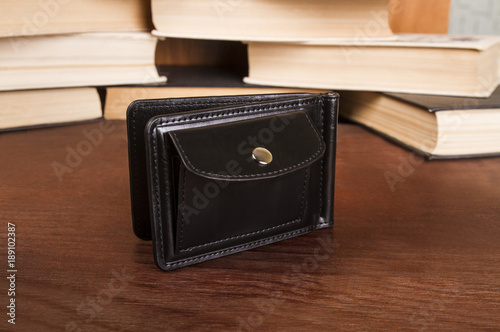 male clamp for money; closed leather wallet