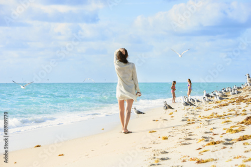 Miami Beach, peaple are walking. Located in Miami, Florida, USA. photo