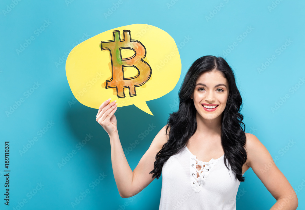 Bitcoin with young woman holding a speech bubble Bitcoin with young woman holding a speech bubble