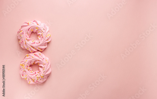 number eight pink cookies and background