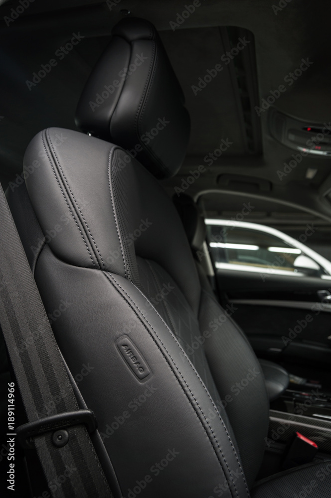 Car interior detail. Leather seat.