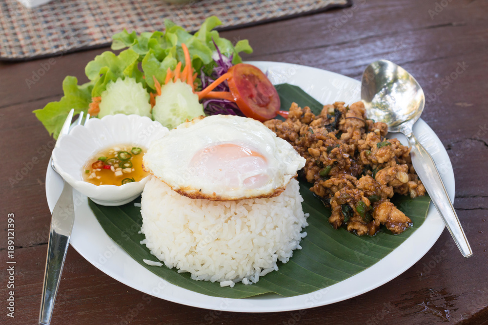 Rice topped with stir-fried pork and basil and Fried Egg(Sunny side up)
Rice topped with stir-fried pork and basil and Fried Egg(Sunny side up)