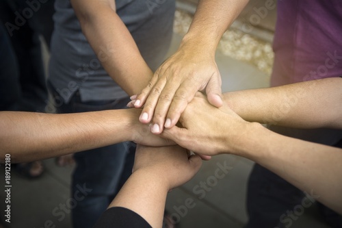 Hands together for unity and share success