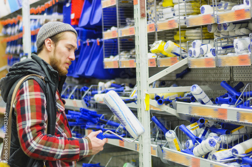 Man in a hardware store © Сергей Лабутин