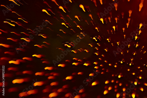 Abstract Orange Colour Light Motion Over Dark Background. Slow Shutter Speed , With Motion Blur Effect To Show Fast Movement