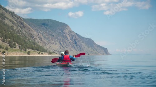 ProRes. Mеn kayaking on Lake Baikal. Travel.