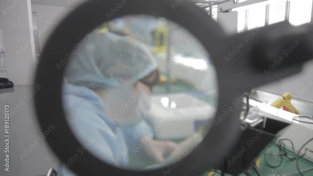 Microchip production factory. Technological process. Assembling the board. Chip. Professional. Technician. Computer expert. Manufacturing. Engineering. Microchip production factory. Technological process. Assembling the board. Chip. Professional. Technician. Computer expert. Manufacturing. Engineering.
