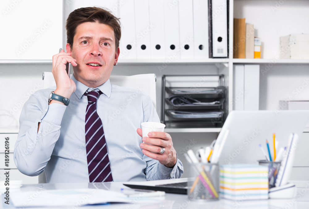 man office worker talking on the phone