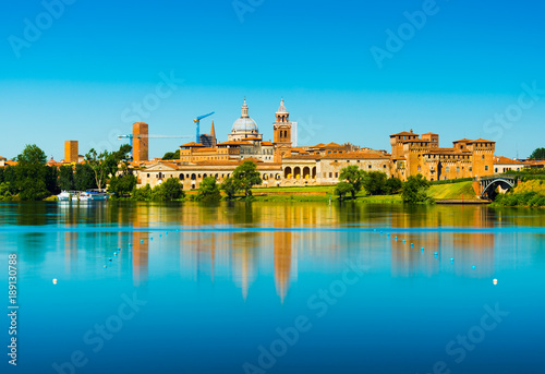 Obraz na płótnie Mantova, Italy: Cityscape reflected in water. Old Italian town skyline. Province of Lombardy. w salonie
