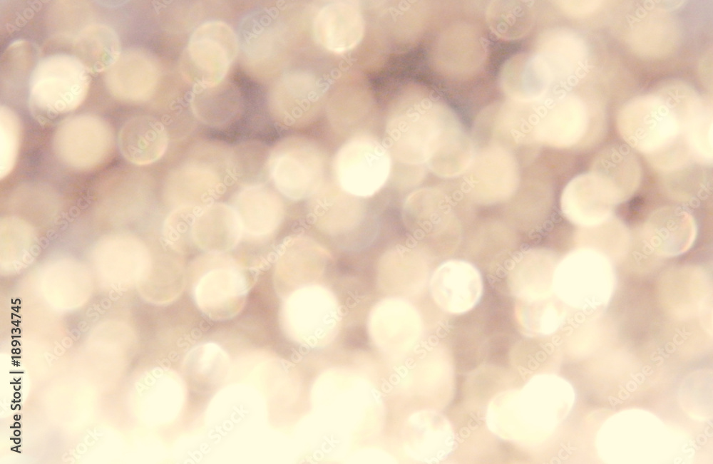 Beautiful blurry golden background, festive bokeh light