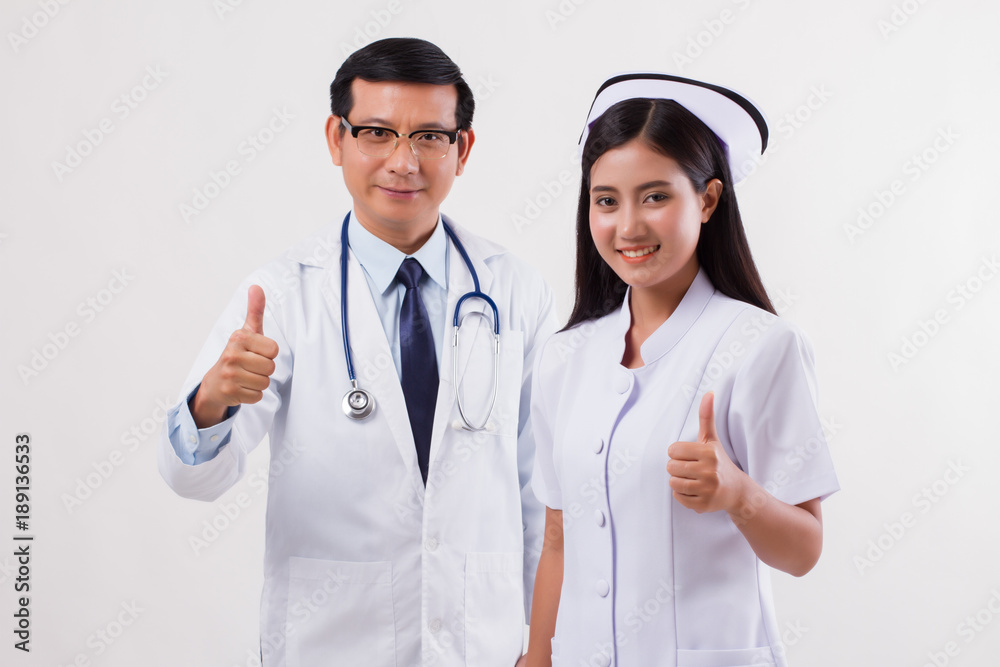 doctor and nurse, medical team giving thumb up doctor and nurse, medical team giving thumb up
