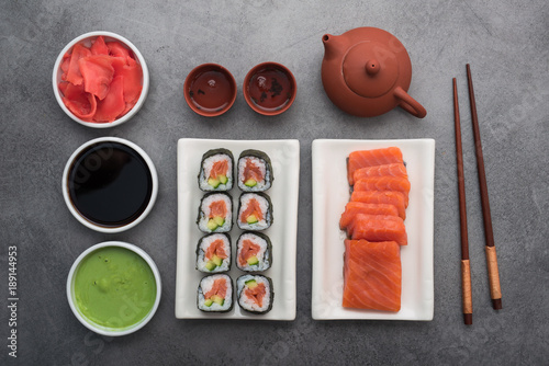 Tea ceremony with sushi salmon and cucumber