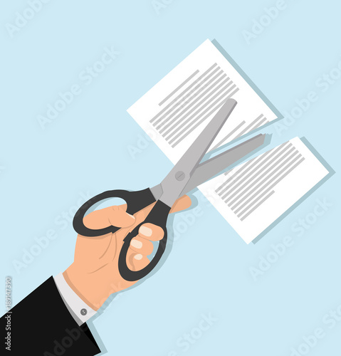 hand holding Scissors cutting paper