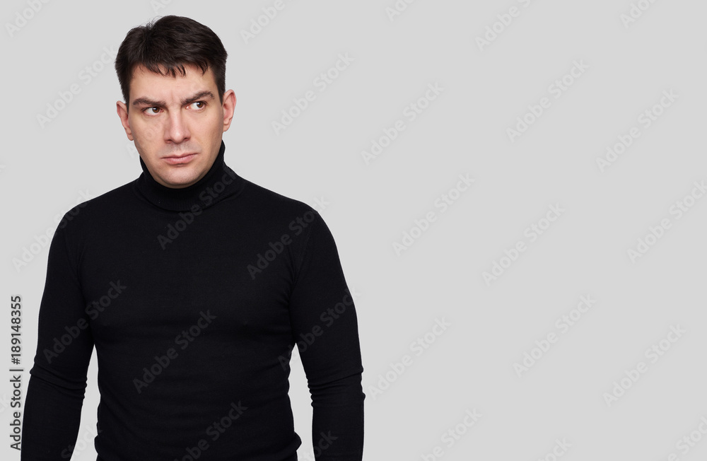 serious handsome man wearing black turtleneck serious handsome man wearing black turtleneck