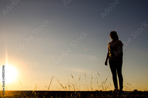 Women are walking when the sun is about to fall.