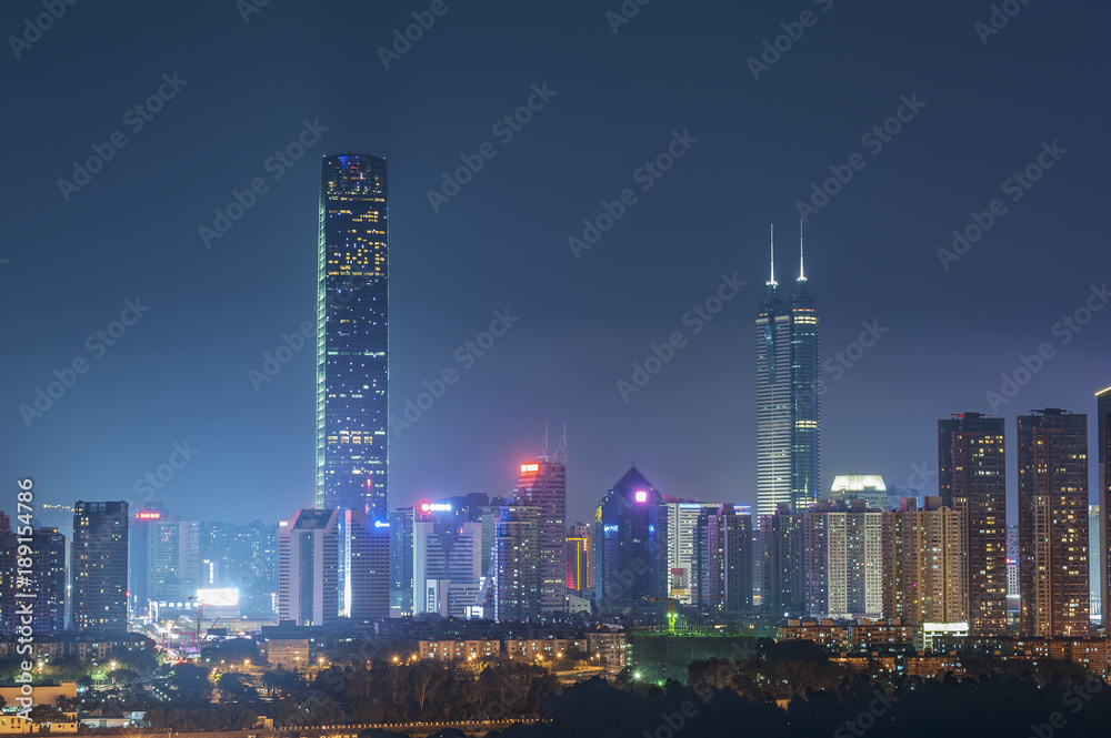 Skyline of Shenzhen City, China at twilight. Viewed from Hong Kong border