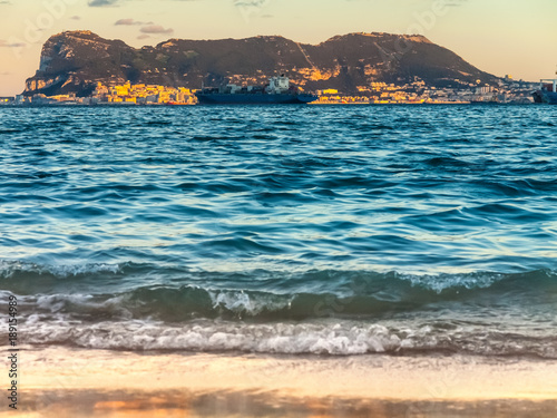 View to the rock of Gibraltar from the opposite beach of Algeciras, Spain