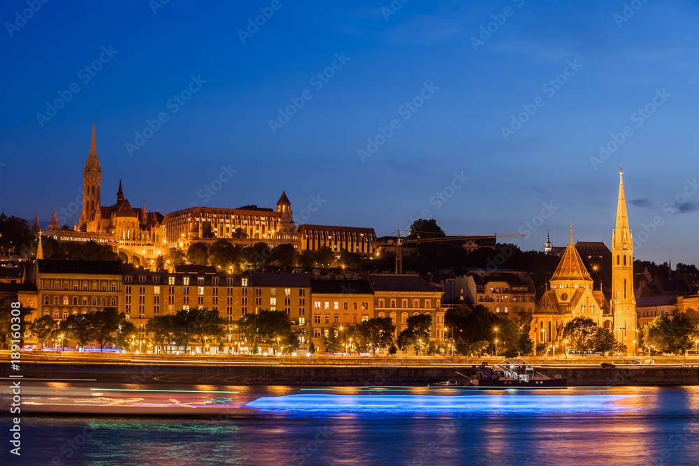 Budapest City From Danube River At Night In Hungary