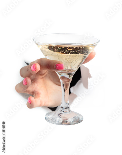 Glass of champagne in the girl's handHand isolated. photo