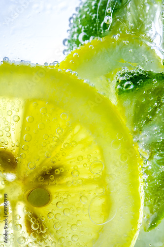Lemon drop in fizzy sparkling water, juice refreshment