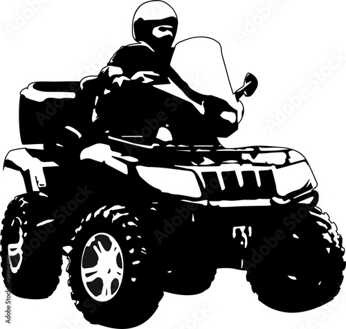 A silhouette of a man on ATV.