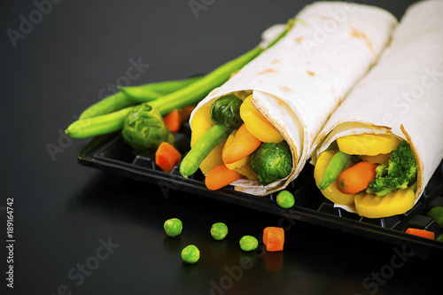 Pita bread stuffed with vegetables and asparagus, healthy breakfast