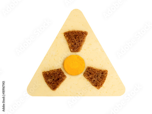 Radioactive radiation danger symbol with yellow and black stripes made from food, concept of unsafe food photo