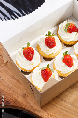 strawberry capcake in a cardboard box