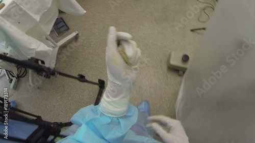 Subjective camera on nurse's head during the surgery, where she walks and takes some surgical instruments (1080p, 25fps)