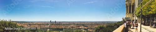 Huge wide Panorama summer view of the city, Lyon, France. With colorful blue sky and white clouds.