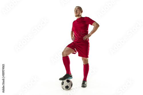 Professional football soccer player with ball isolated white background