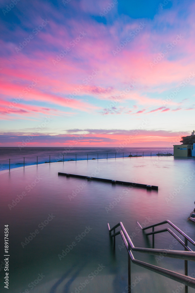 Colorful dawn color at Bronte rock pool, Sydney.