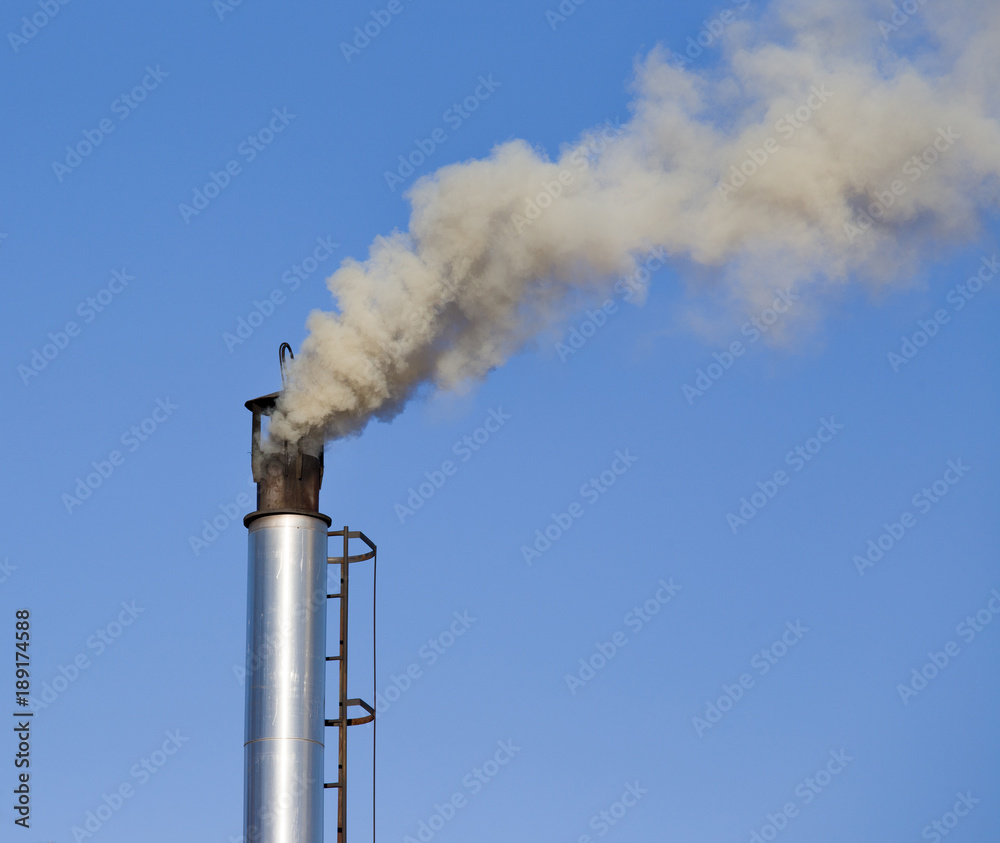 Industrial chimney with smoke Industrial chimney with smoke
