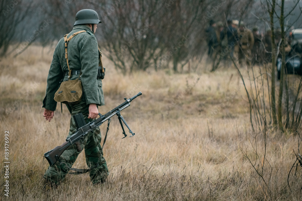 German soldier with a machine gun in the field German soldier with a machine gun in the field