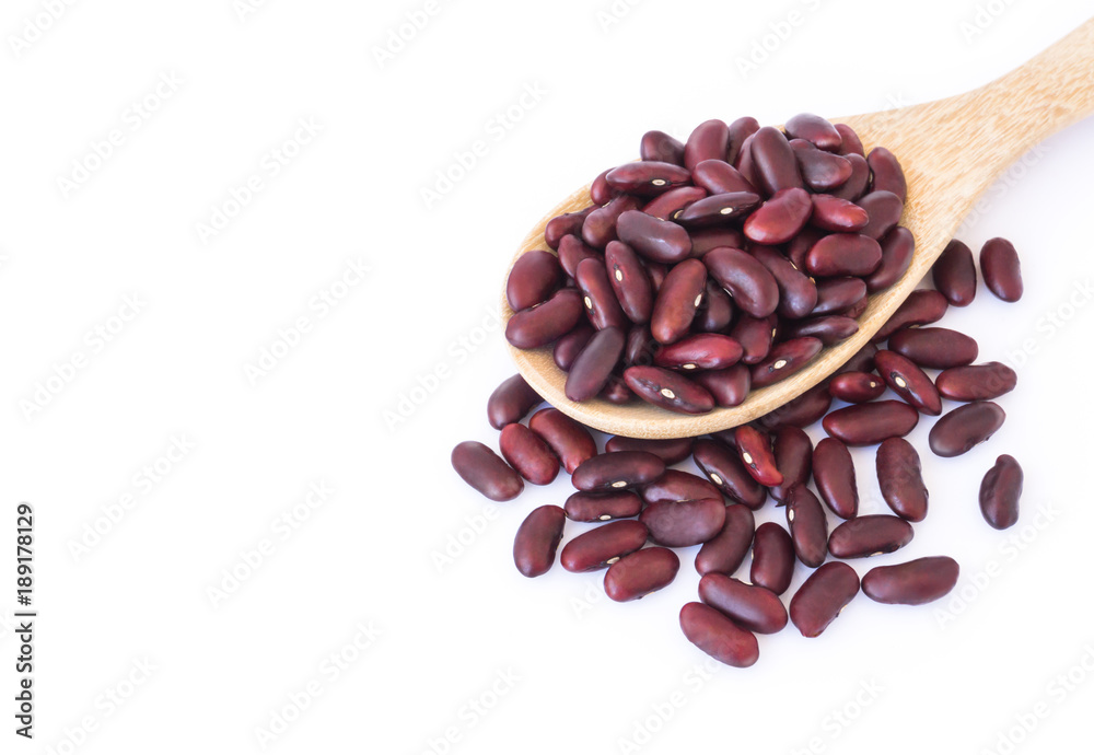 Closeup red beans in wood spoon on white background, healthy food concept Closeup red beans in wood spoon on white background, healthy food concept
